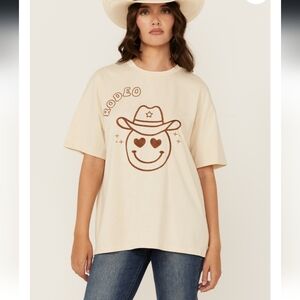Blue B embroidered Rodeo smiley face heart eyes emoji with an adorable star hat